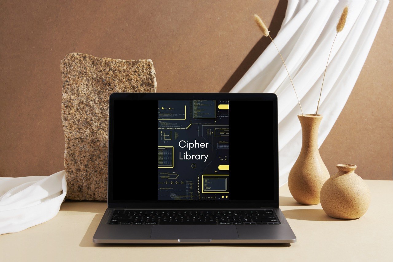 Laptop with 'Echo Module' display on a table with decorative items